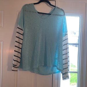 Size : Small. Baby Blue Blouse w/ Patterned Sleeves. Brand: Pink Lily Boutique.